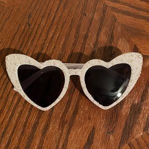 White, heart-shaped accented sunglasses